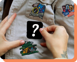 Teaser-foto van de geborduurde Dag van de Jeugdbeweging-badge 2026 